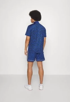 PUMA Golf Hoops X Golf Short - Korte Broeken - Clyde Royal 8 PUMA Golf Hoops X Golf Short - Korte Broeken - Clyde Royal -Charmant Golfen Winkel 1a93a2758ea3462fb553a176ab510eac