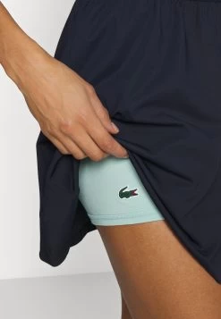 Lacoste Sport Golf Dress - Jurken - Bleu Marine Vert Clair -Charmant Golfen Winkel 7fde95a99b3e460ebb5db2b7d893a53e