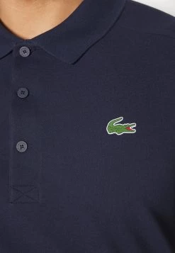 Lacoste Sport Golf - Poloshirt - Bleu Marine -Charmant Golfen Winkel 963810127c6c41eeb96059ae05248a27